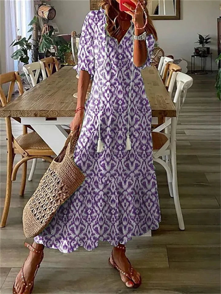 Clara - Robe Maxi d'Été Femme à Imprimé Ethnique Col V avec Pompons et Jupe Ample Bohème